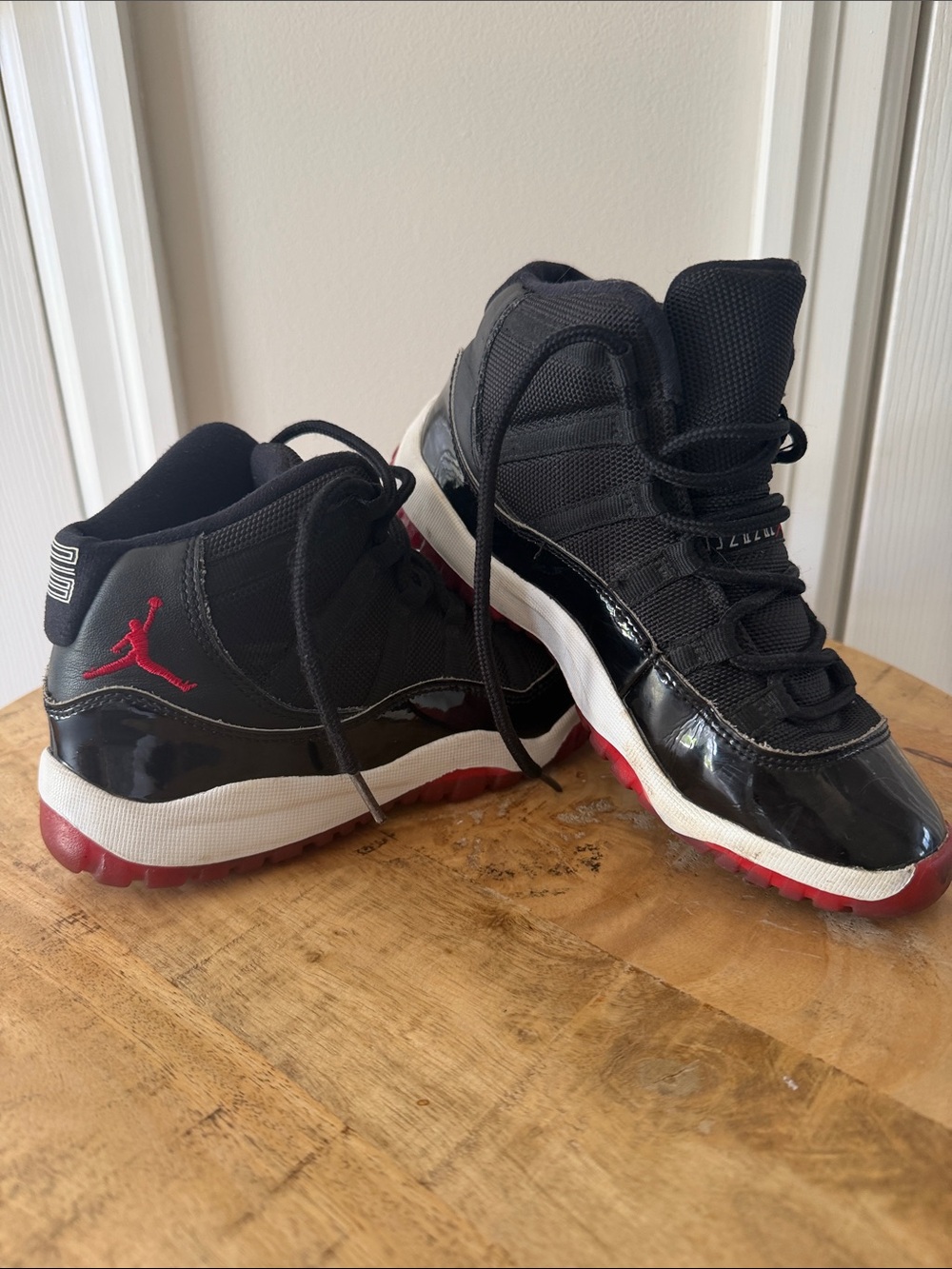 Little Kids Jordan 11’s “Bred’s” Black and Red High-Top Basketball Sneakers